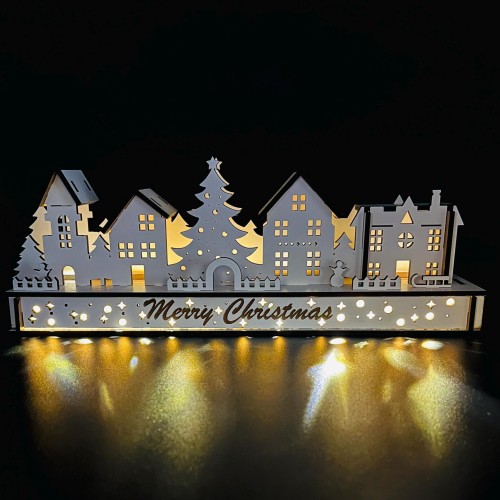 White wood Christmas light up decoration - two different scenes - village with tree and houses or a carousel. Hand assembled with LED lights White wood Christmas light up decoration - two different scenes - village with tree and houses or a carousel. Hand assembled with LED lights
