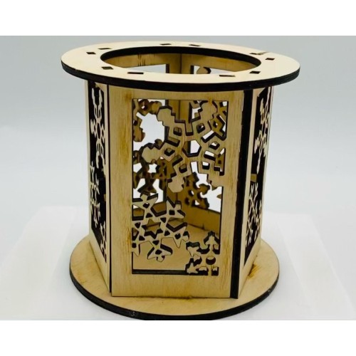 Snowflake tealight holder - gives cosy glow - hand assembled wooden laser cut tealight holder Snowflake tealight holder - gives cosy glow - hand assembled wooden laser cut tealight holder